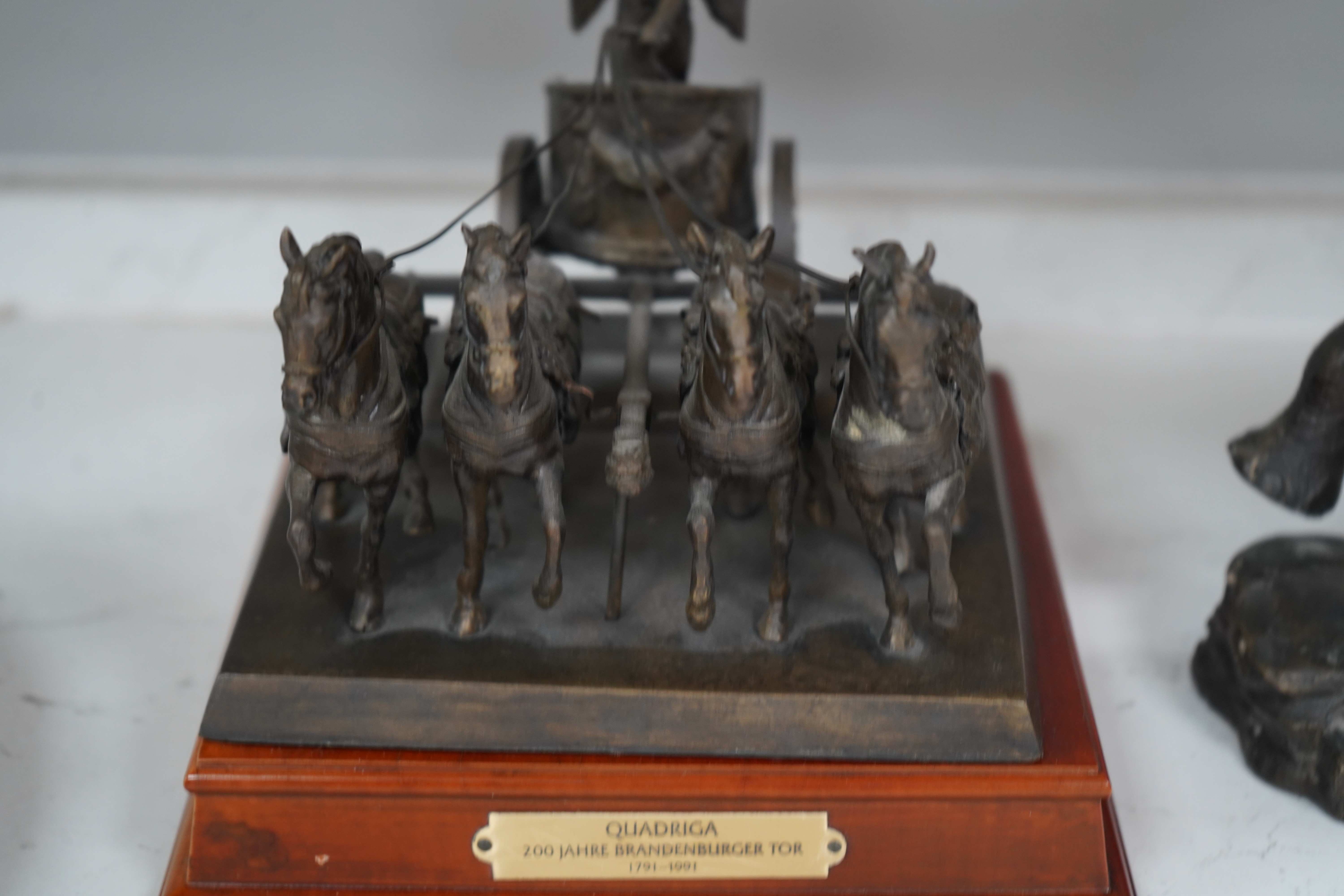 A Franklin Mint bronzed figure of an elephant, 'Giant of the Serengeti', and a Franklin Mint bronzed model 'Quadriga', on wooden plinth, with title plaque, largest 23.5cm. Condition - good